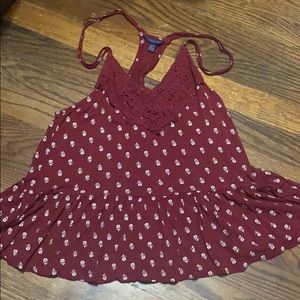 Burgundy top with white sunflowers